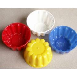 4 oude kleine puddingvormen met diermotief