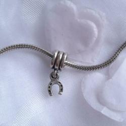 Zilveren bedels, charms met paard en hoefijzer, prijs p.s.