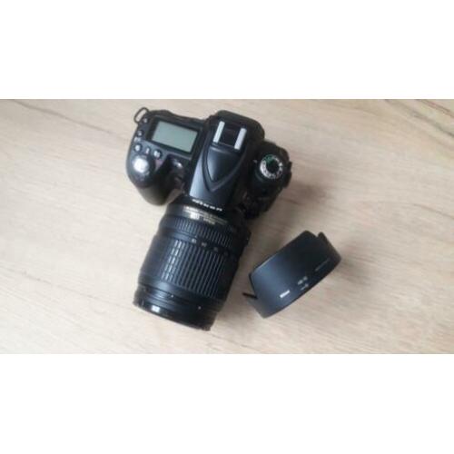 Nikon D90 met lens AF-S Nikkor 18-105 + toebehoren