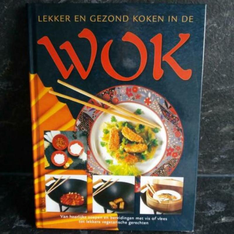 Lekker en gezond koken in de wok. Hardkaft boek uit 1991