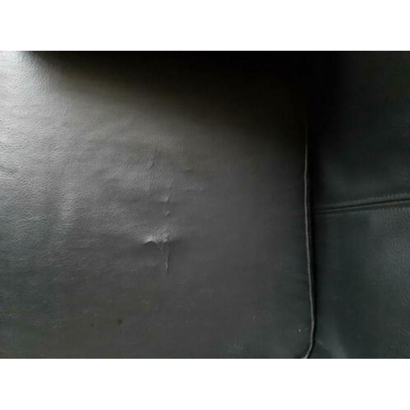 4 zwarte stoelen op wieltjes