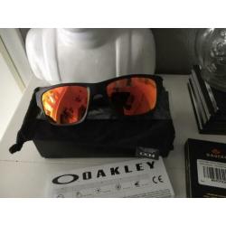 Oakley Jupiter matte black +Polarized Fire Redglazen NIEUW