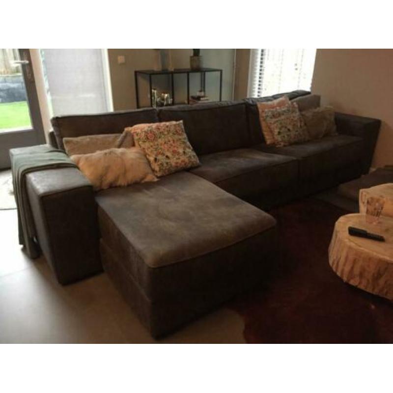 Mooie bank met chaise longue