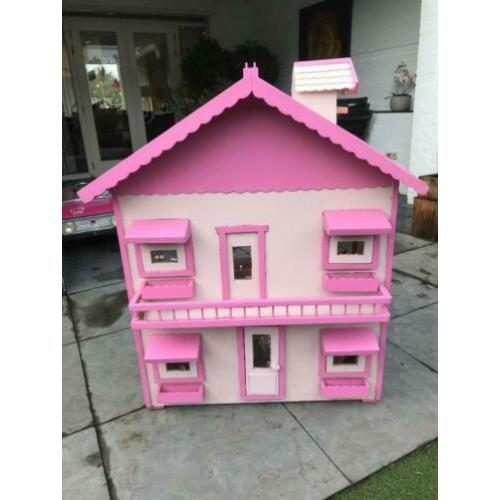Groot poppenhuis met meubels, verlichting en poppen