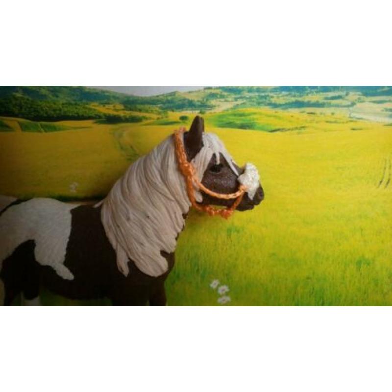 Schleich touwhalster met neusbontje oranje
