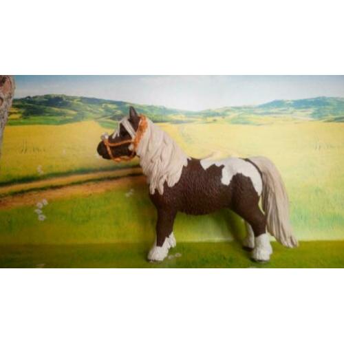 Schleich touwhalster met neusbontje oranje