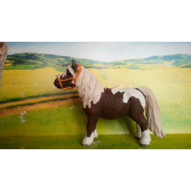 Schleich touwhalster met neusbontje oranje