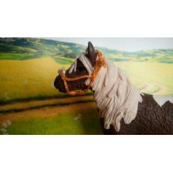 Schleich touwhalster met neusbontje oranje