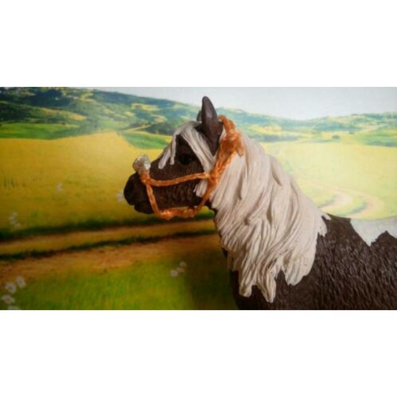 Schleich touwhalster met neusbontje oranje