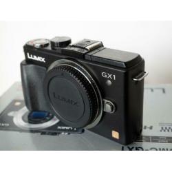 Panasonic Lumix DMC GX1 + Lumix G Vario 12-32 mega ois.