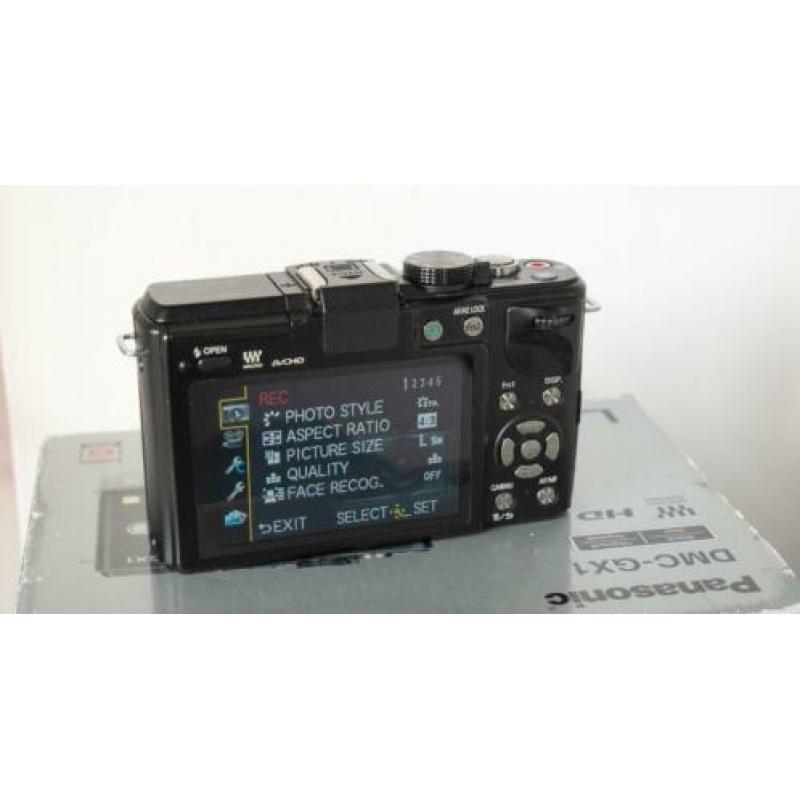Panasonic Lumix DMC GX1 + Lumix G Vario 12-32 mega ois.