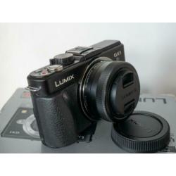 Panasonic Lumix DMC GX1 + Lumix G Vario 12-32 mega ois.