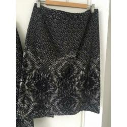 Rok en lang vest als set.