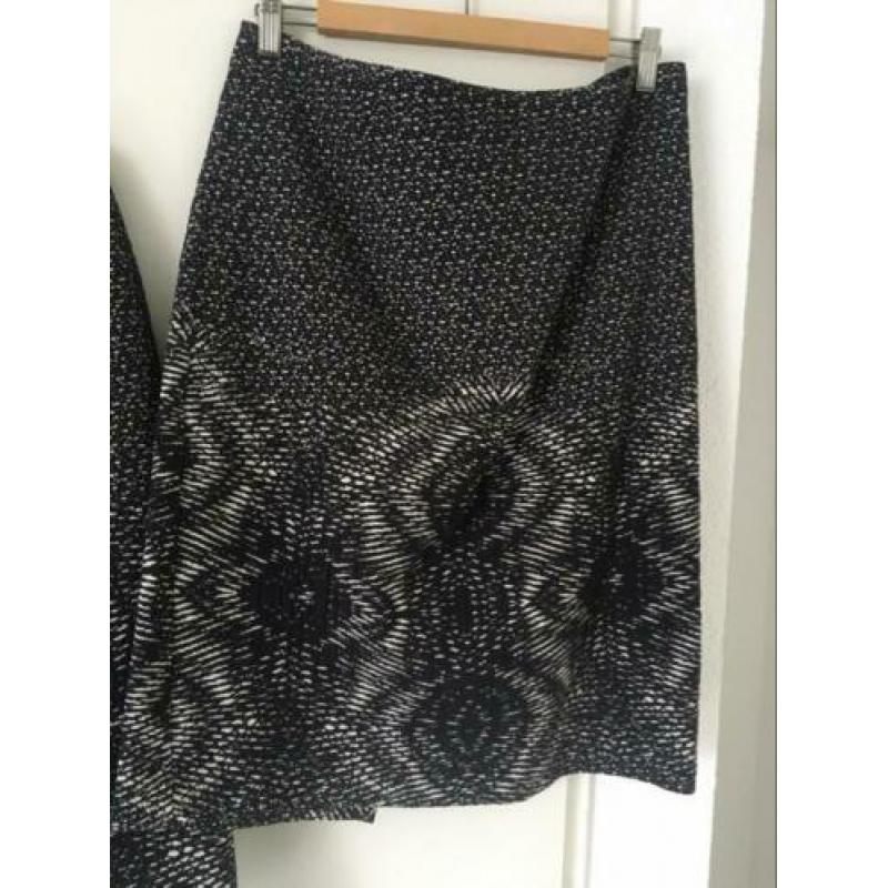 Rok en lang vest als set.
