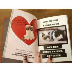 Grumpy Cat levensgids en ansichtkaarten