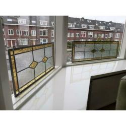 Vier glas in lood ramen