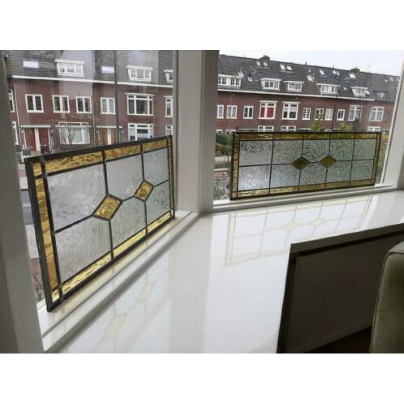 Vier glas in lood ramen