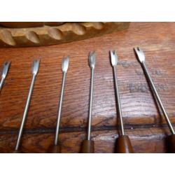 Vintage houten vis met cocktailprikkers
