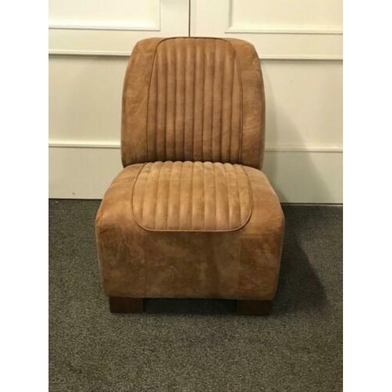 Fauteuil in stoer leer