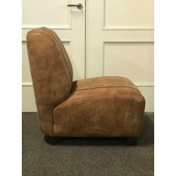 Fauteuil in stoer leer