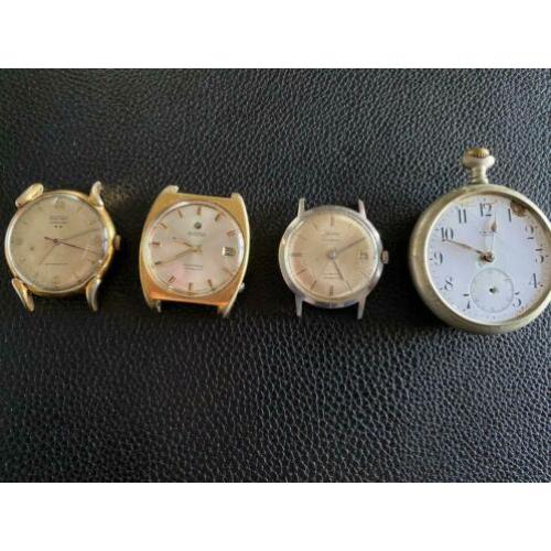 7 vintage horloges met werk.