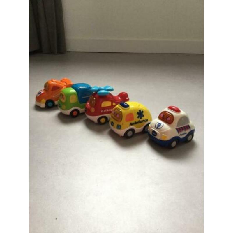 Toet toet auto politiebureau, lanceerbaan en diverse auto’s.