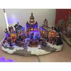 Kerstdorp met licht