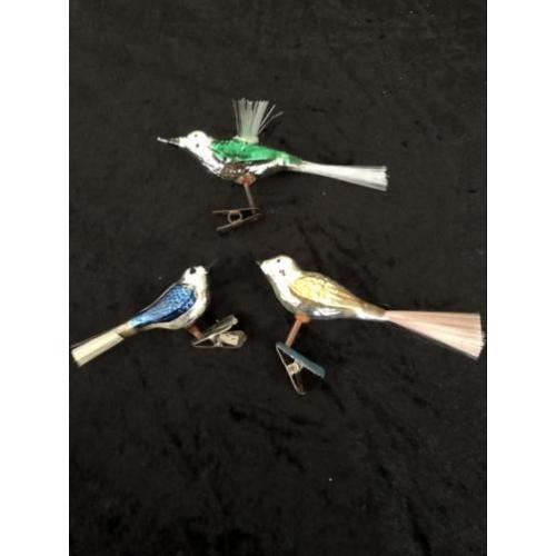 Antieke gekleurde kerstvogeltjes van glas