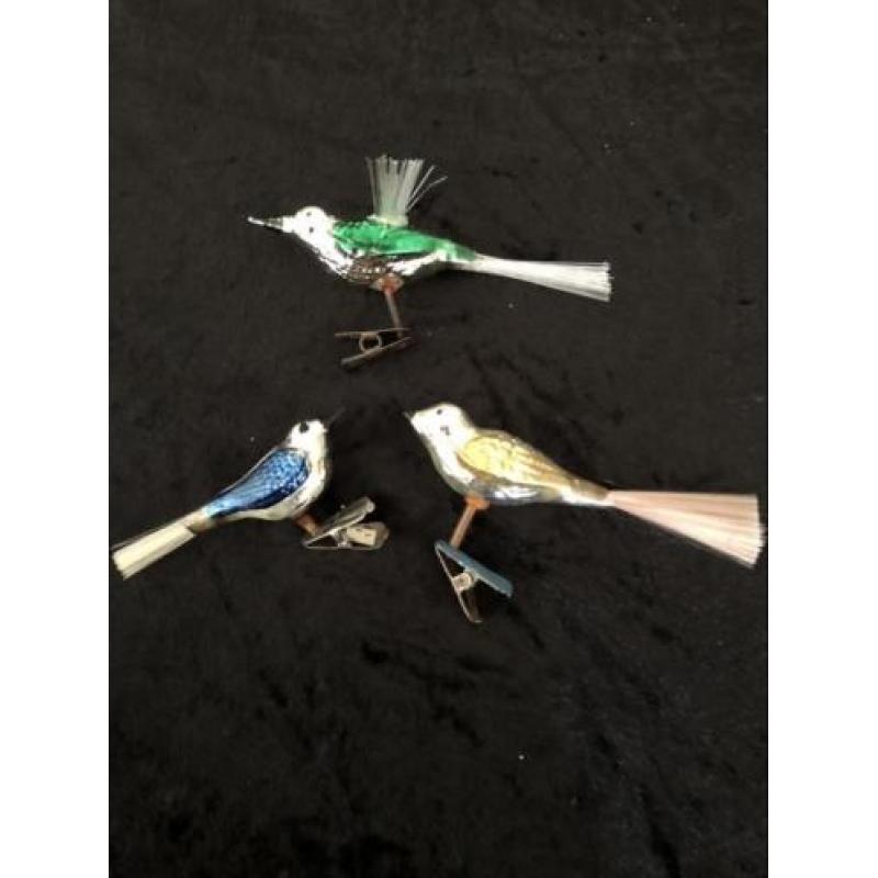 Antieke gekleurde kerstvogeltjes van glas