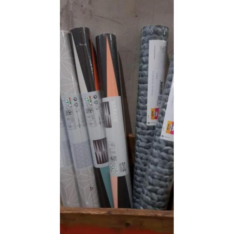 2 nieuwe rollen behang met wol/gebreid patroon