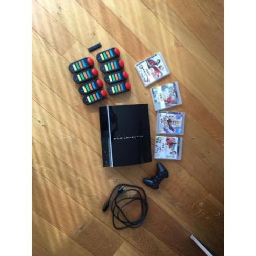 PlayStation 3 met spellen en controllers